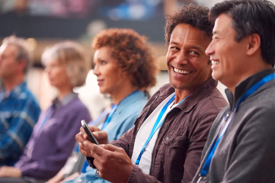 a group of members talking and texting